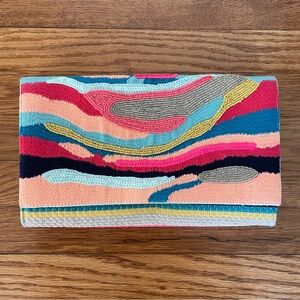 America & Beyond Clutch